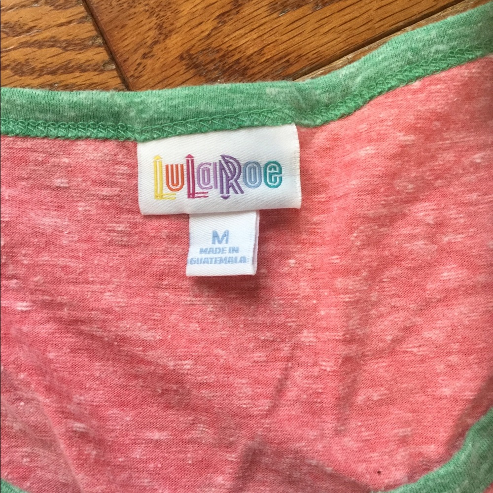 Lularoe Nicole pink with green trim. Size M